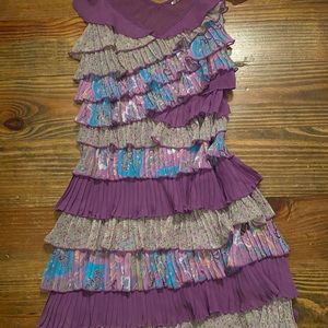 Beautiful colored ruffled top.